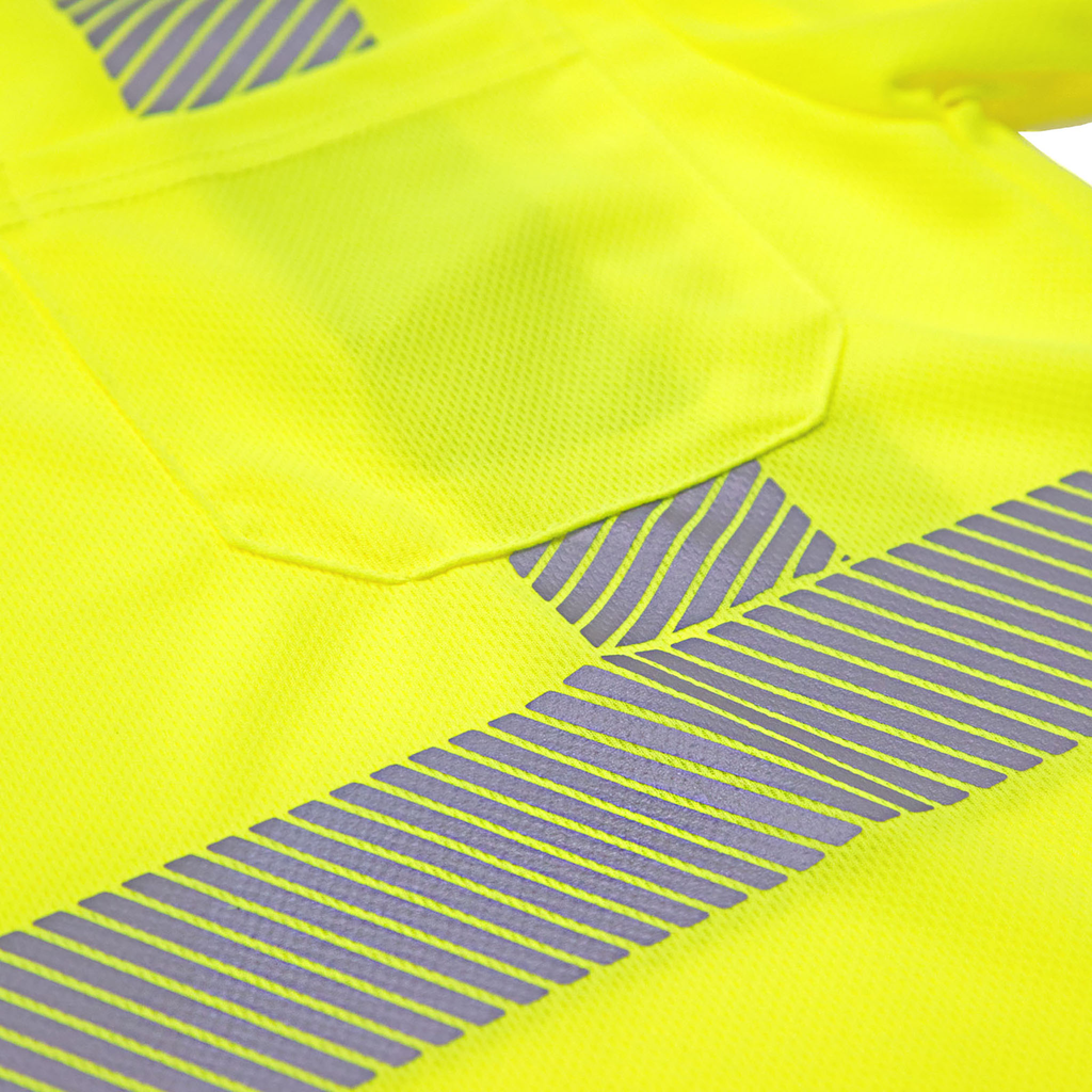 Safety shirt with chest pocket and segmented heat transfer strip with birds eye fabric