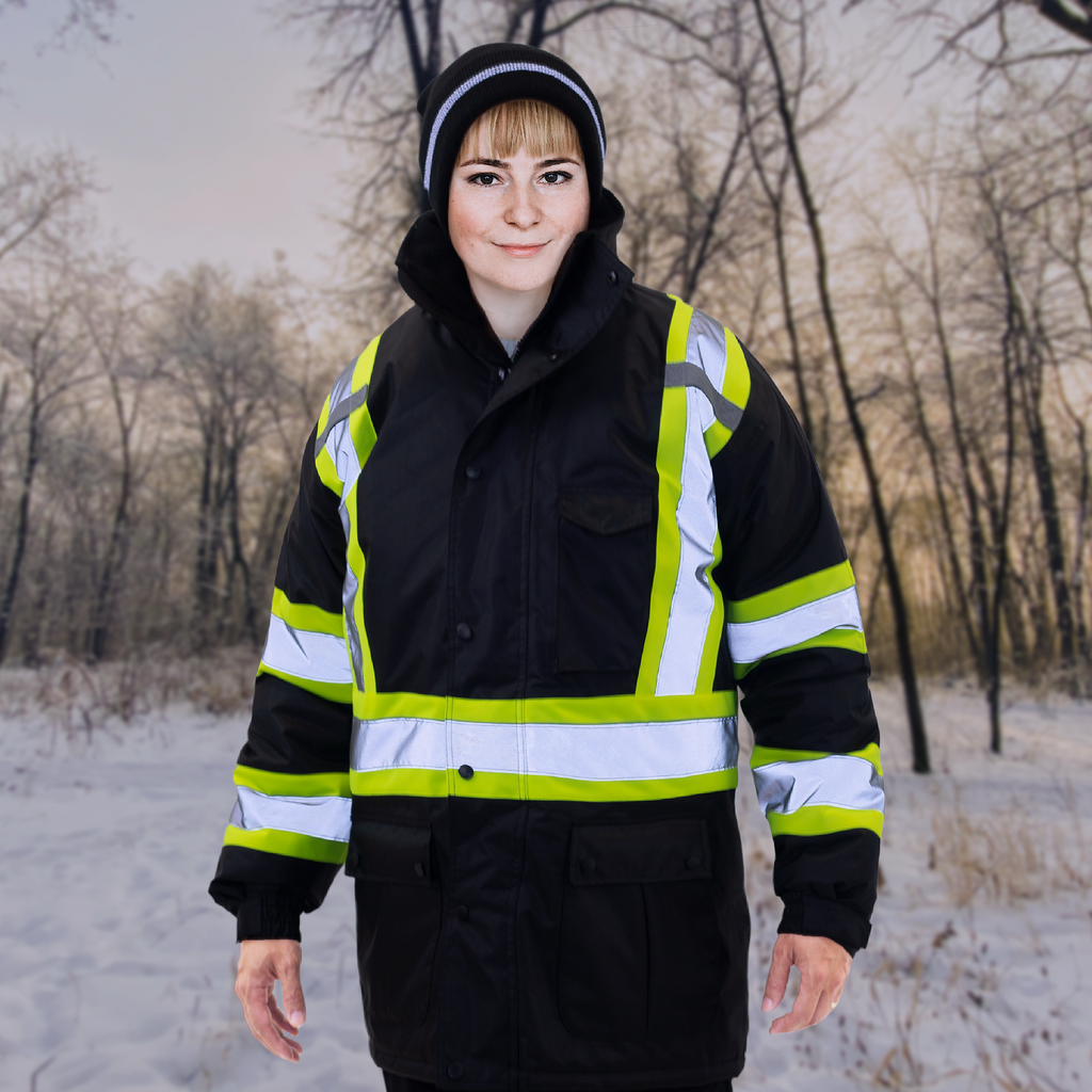 Woman wearing the insulated hi vis ANSI insulated parka jacket for winter