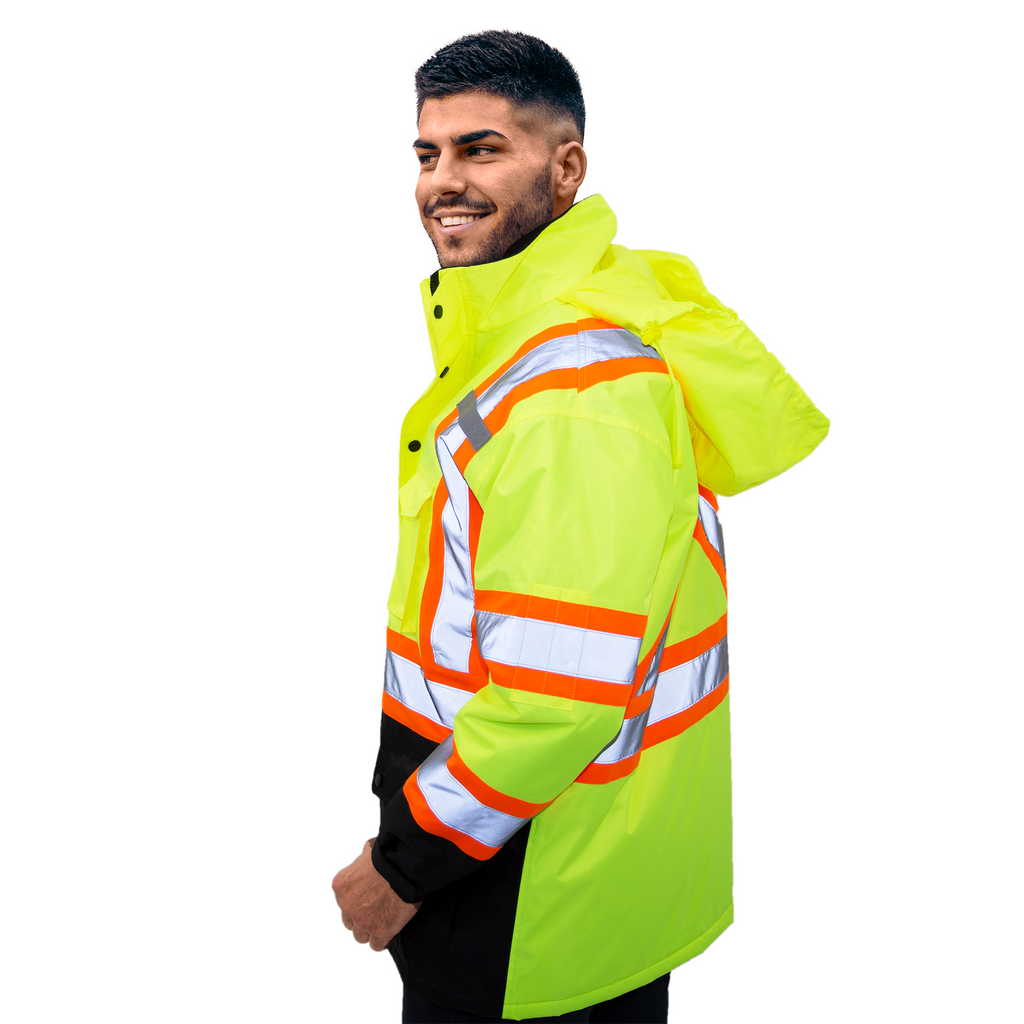 Man wearing the JORESTECH two tone lime and orange hi vis safety parka jacket with reflective stripes and X on the back