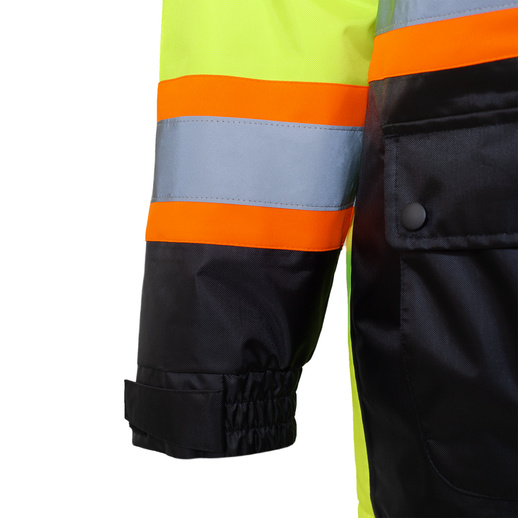 Detail of the elasctic cuff, the 2 tone reflective material and the waist pocket of the insulated parka jacket