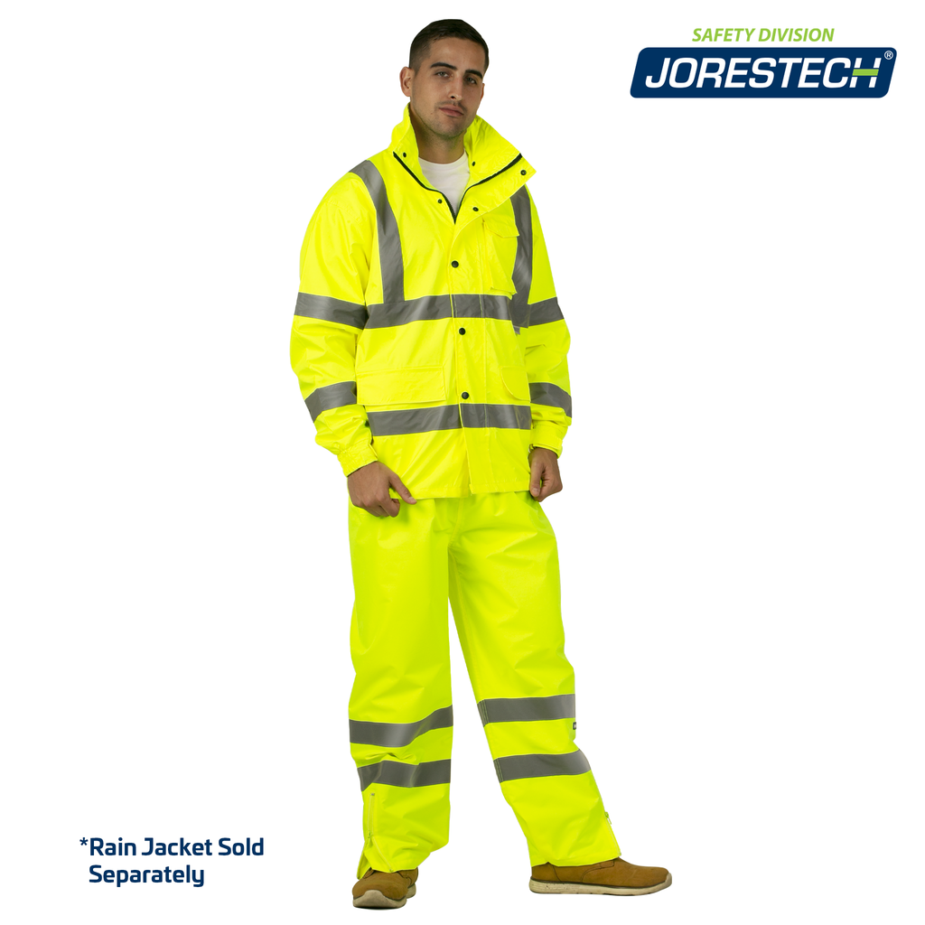 Man wearing the Jorestech high visibility rain pants and rain jacket. Text reads "rain jacket sold separately"