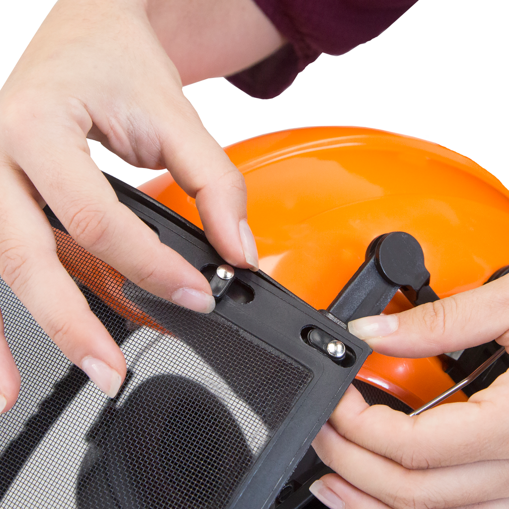 the hands of a person closing the security brackets to the base that keeps the face shield attached to the JORESTECH cap style safety hard hat.