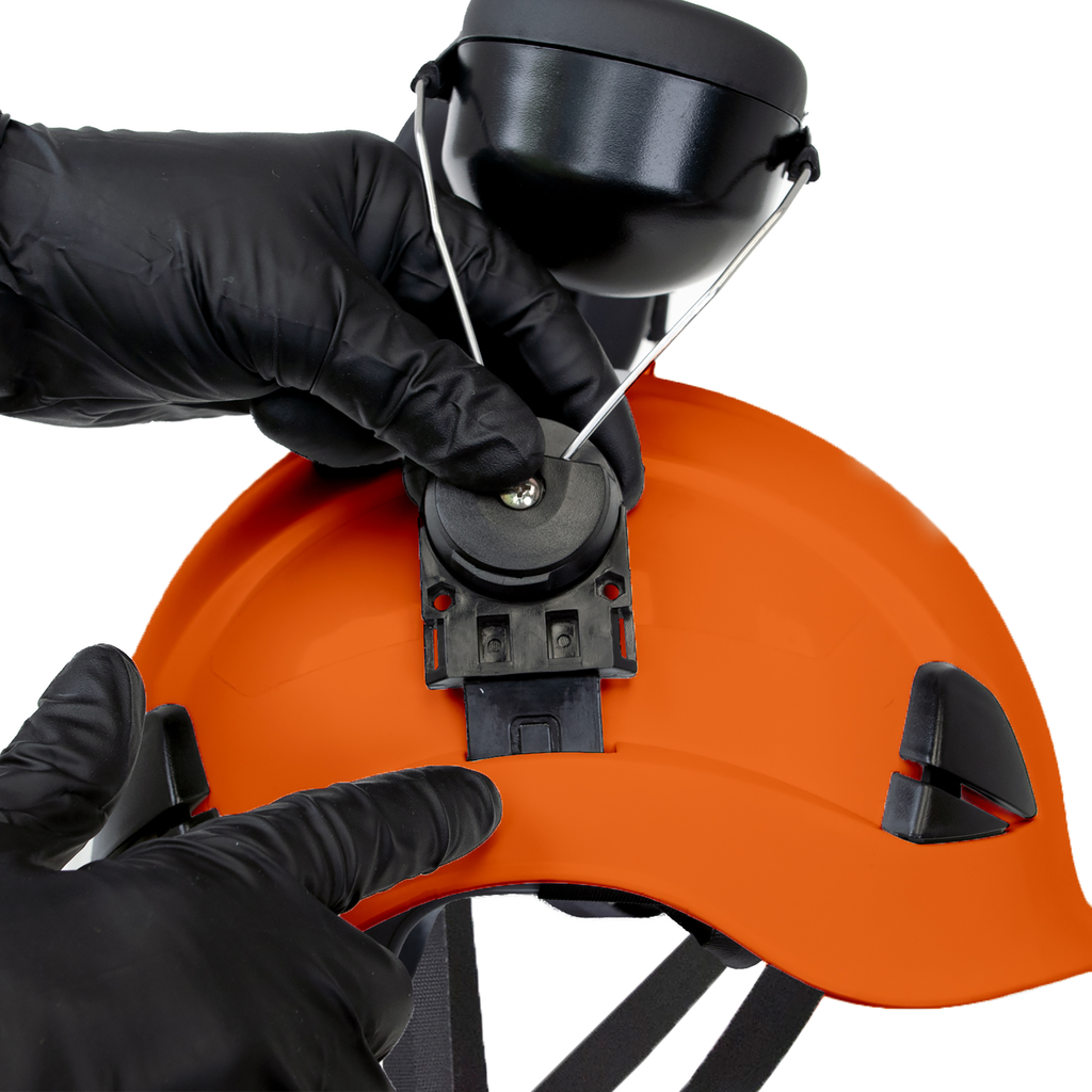 Close-up Image of a person mounting a pair of earmuffs onto the Jorestech orange 3-in-1 helmet