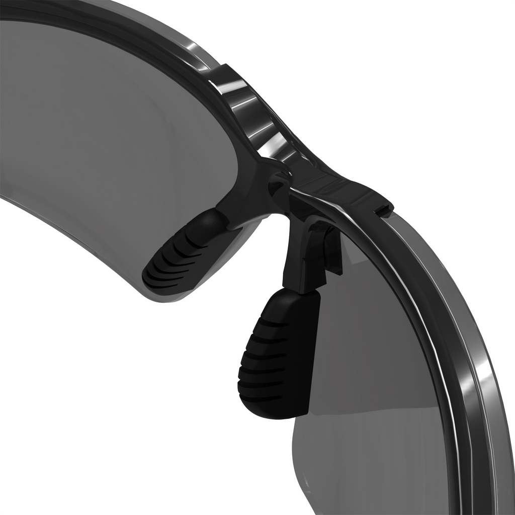 Close up of the soft adjustable nose bridge of the JORESTECH high impact safety glasses with flexible rubber temple smoke lenses and black frame